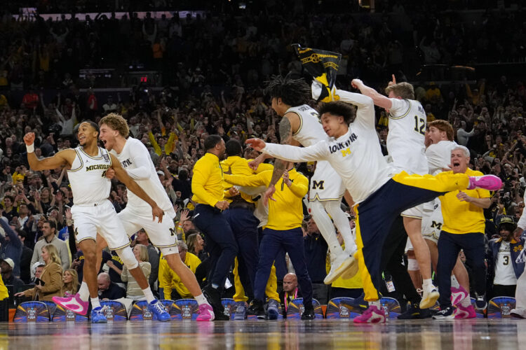 Michigan men muscle way to program's 2nd national title